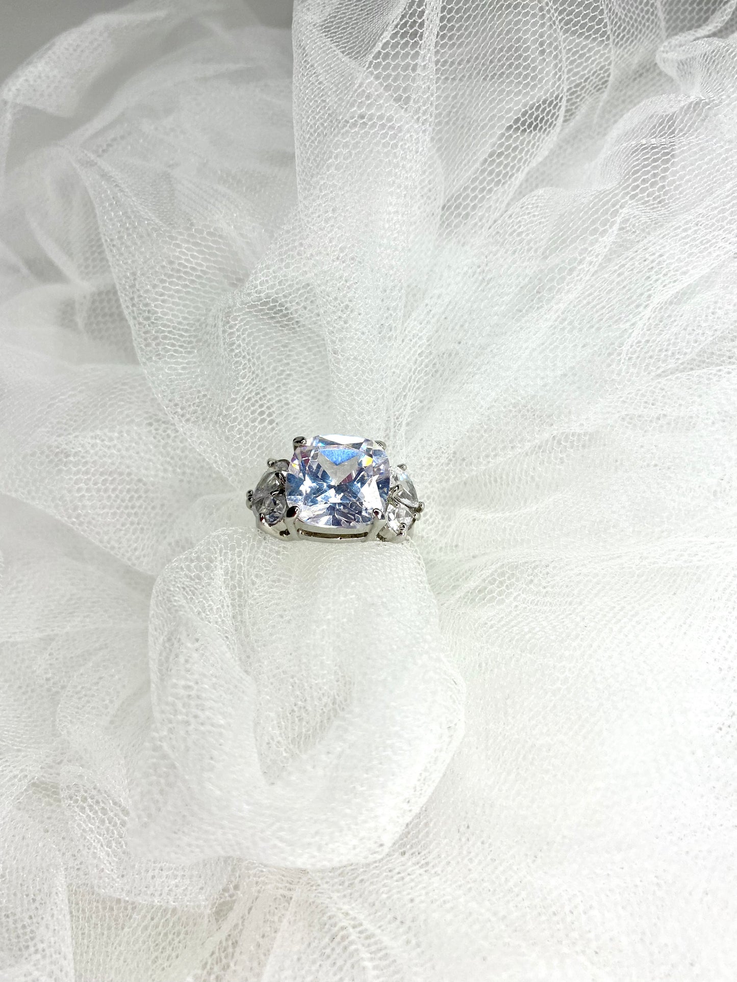 White trilogy ring