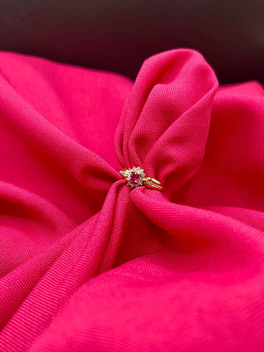 Pink solitaire ring